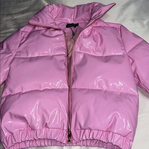 Pink leather puffer coat.